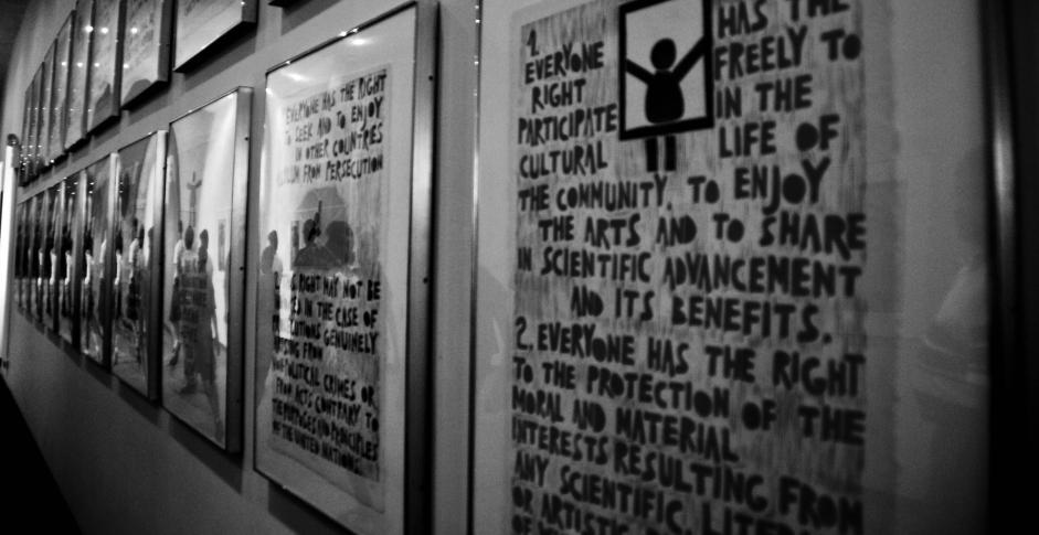 Image by Zack Lee, used under Creative Commons license. Photo of framed representations of each human right included in the Declaration of Human Rights at UN.